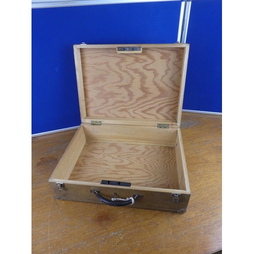 531 - A wooden storage case.