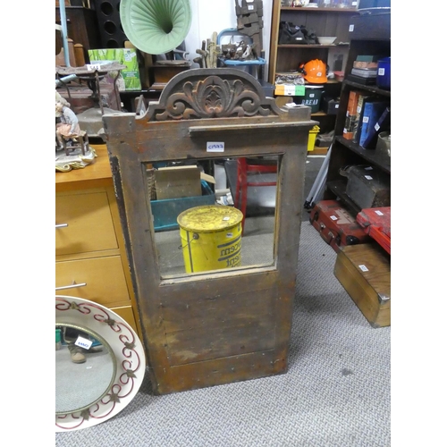 536 - An antique carved panel door with mirror either side. Approx 86x47cm.