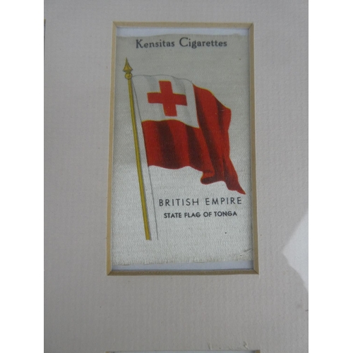 538 - A framed set of vintage silk flags. Approx  30x40cm.