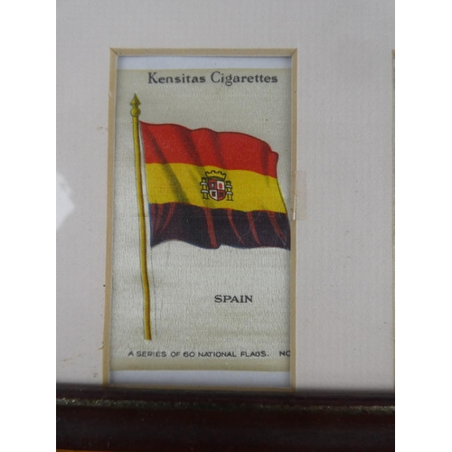 538 - A framed set of vintage silk flags. Approx  30x40cm.