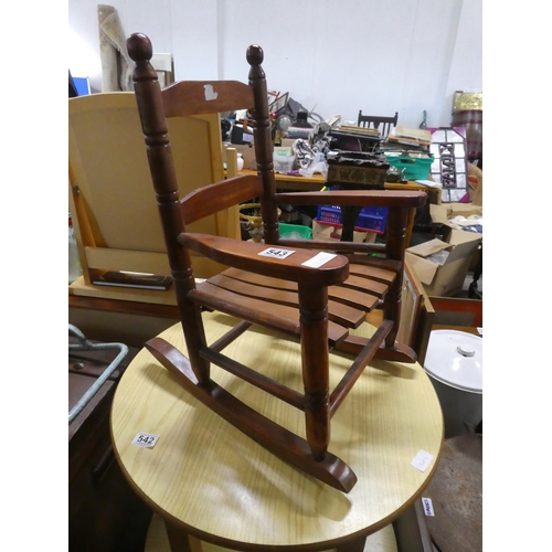 543 - A miniature wooden framed rocking chair' Approx  55cm.