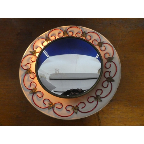 546 - A vintage illuminated wall mirror.