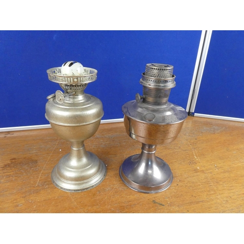 548 - A vintage Aladdin No 21 oil lamp base and another.