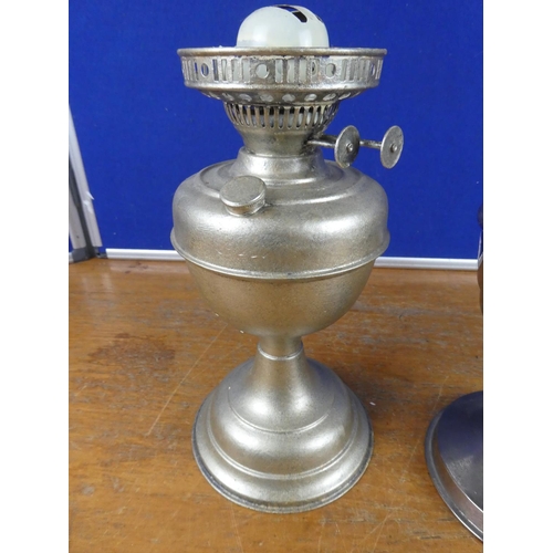 548 - A vintage Aladdin No 21 oil lamp base and another.