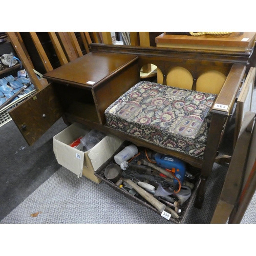 563 - A vintage oak framed telephone seat.