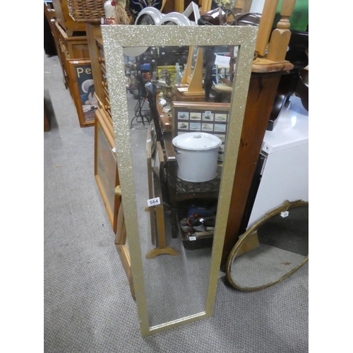 564 - A framed wall mirror with a sparkle frame.  Approx  119x28cm.