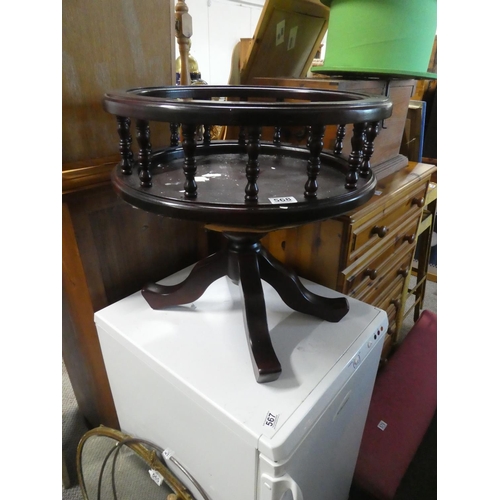 568 - A barrel shaped table plant stand.