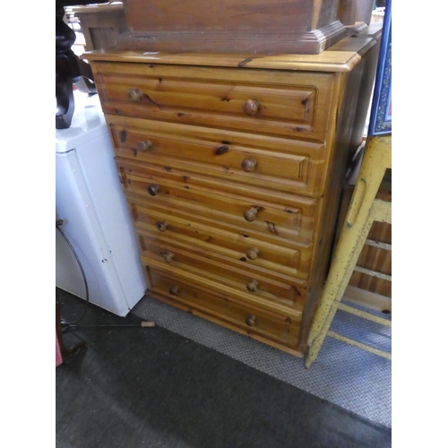 571 - A pine chest of six drawers. Approx  105x75cm.