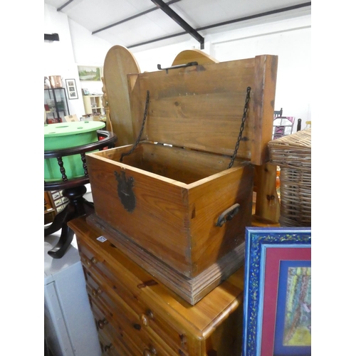 572 - A small pine storage trunk with metal work detail.