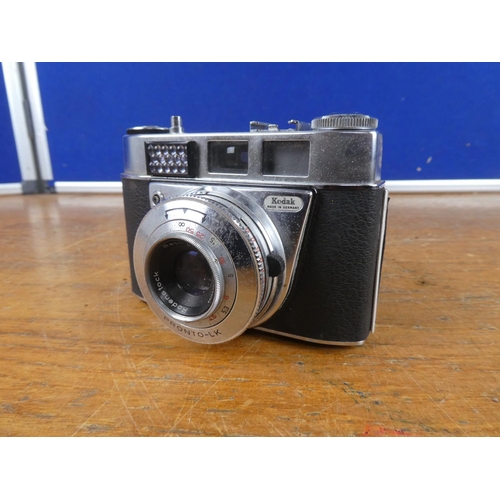 574 - A vintage leather cased Kodak Pronto -LK camera.