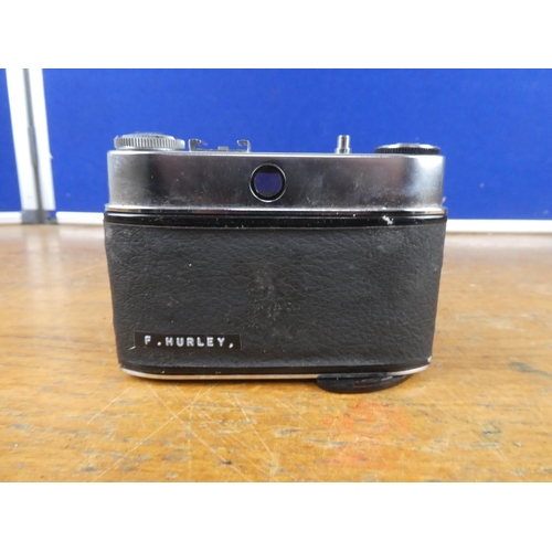 574 - A vintage leather cased Kodak Pronto -LK camera.