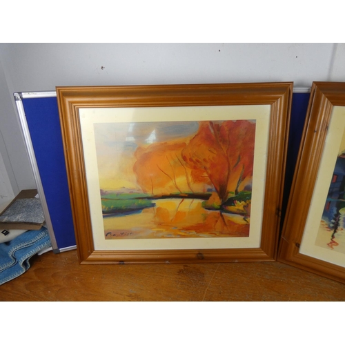 578 - A pair of pine framed pictures.  Approx  50x60cm.