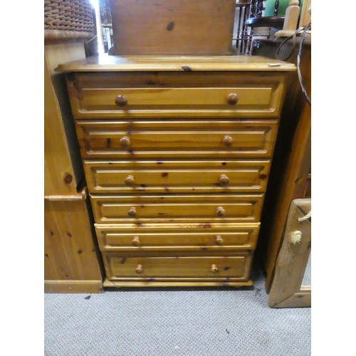 579 - A pine chest of six drawers.  Approx  107x75cm.