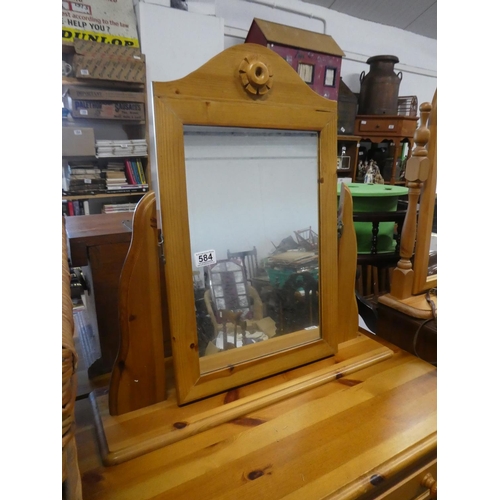 584 - A pine cheval dressing table mirror.