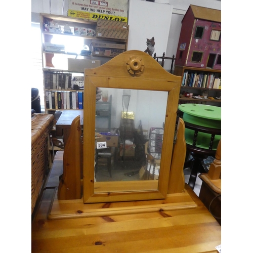 584 - A pine cheval dressing table mirror.