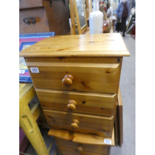 589 - A pine three drawer bedside cabinet. Approx  54x42cm.