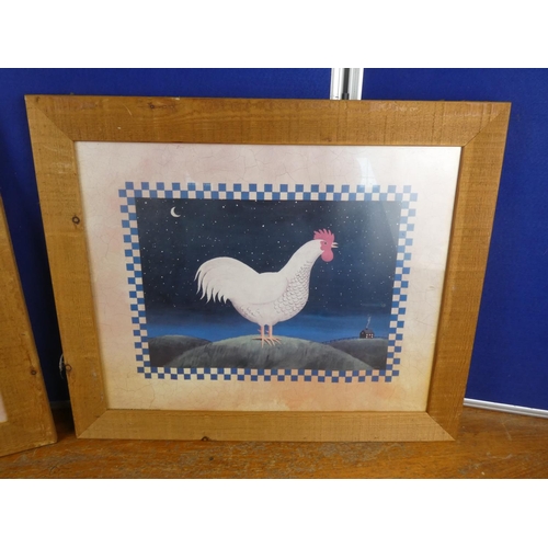 592 - A pair of framed pictures of a pig and hen.  Approx  40x50cm.