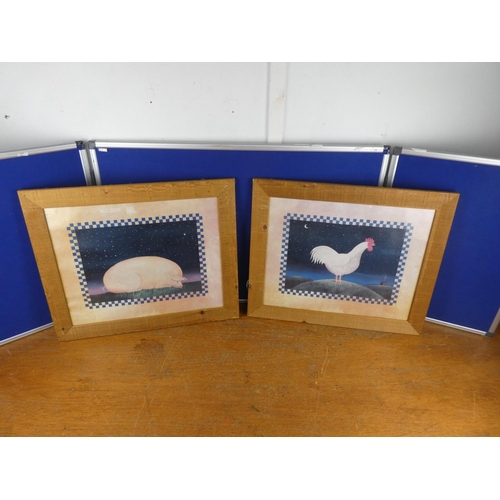 592 - A pair of framed pictures of a pig and hen.  Approx  40x50cm.