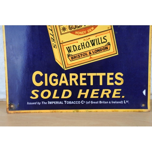 601 - A Wills's cigarette metal sign. Approx  30x40cm.