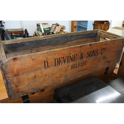 604 - An antique wooden crate for D Devine & Son Ltd, Belfast.  Approx  24x90cm.