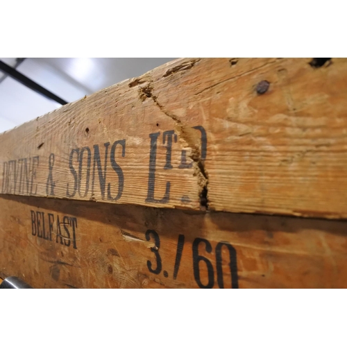 604 - An antique wooden crate for D Devine & Son Ltd, Belfast.  Approx  24x90cm.