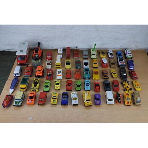 629 - A box of assorted diecast cars, trucks and more.