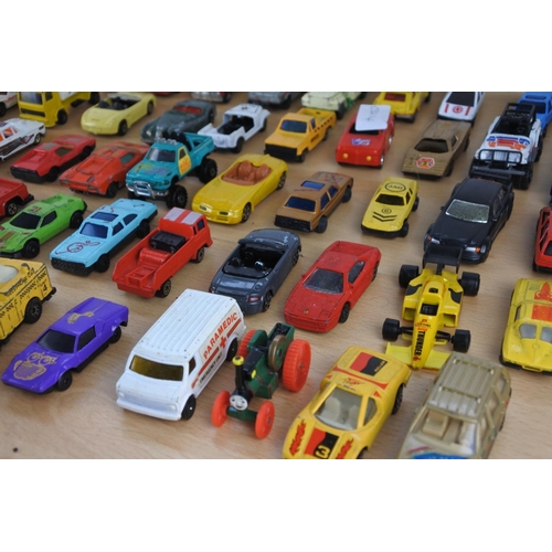 629 - A box of assorted diecast cars, trucks and more.