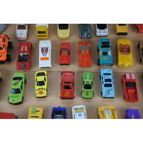 629 - A box of assorted diecast cars, trucks and more.