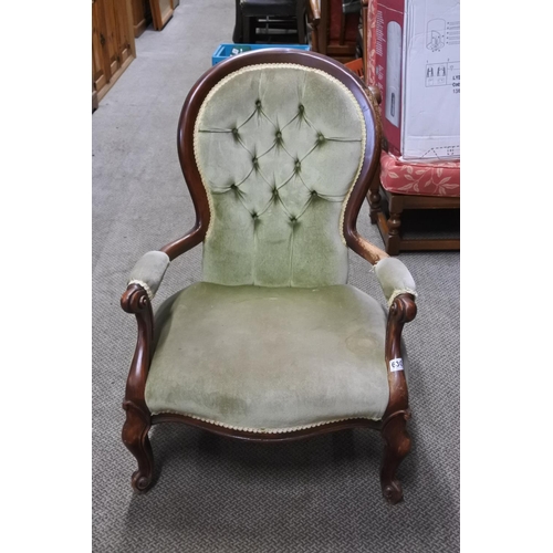 630 - An antique spoon back chair.