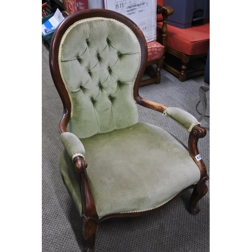 630 - An antique spoon back chair.