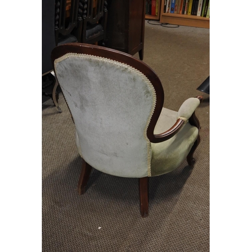 630 - An antique spoon back chair.