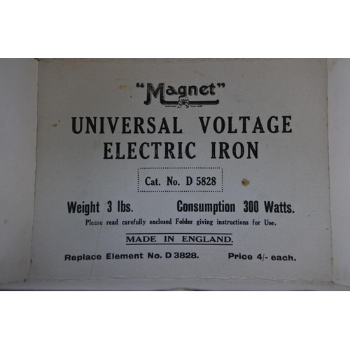 665 - A boxed vintage 'Magnet' universal voltage electric iron.