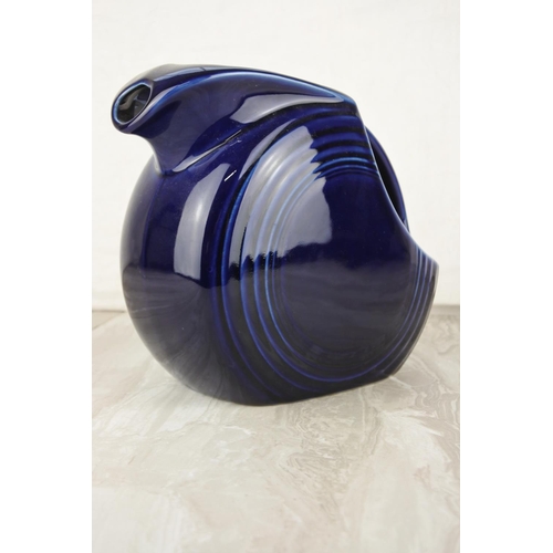 677 - A vintage Fiesta pottery jug.