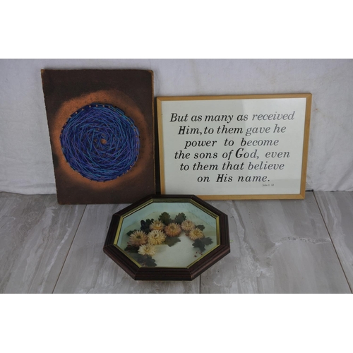 696 - A boxed framed picture of dried flowers, a religious framed script and a nail and wool art board.