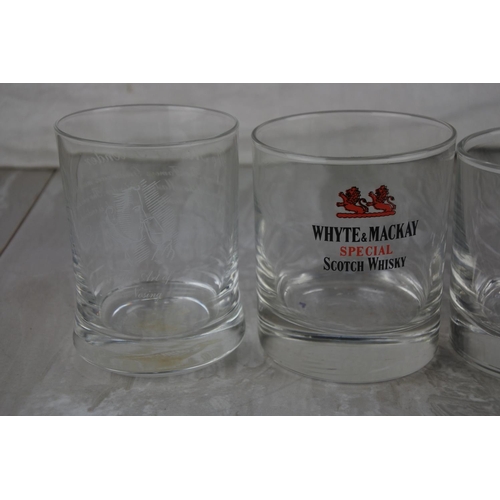 710 - Four embellished whiskey glasses.