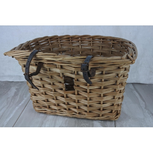 713 - A vintage wicker bicycle basket.