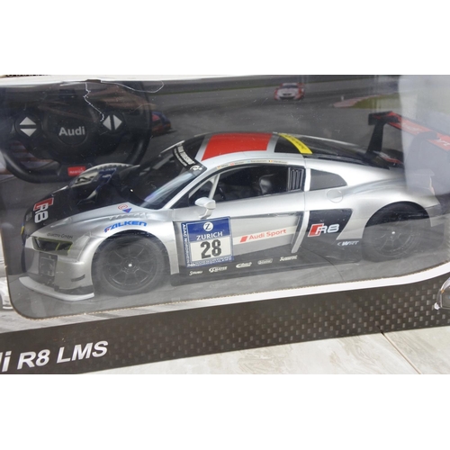 714 - A boxed Audi R8 LMS remote controlled car, scale 1:14.