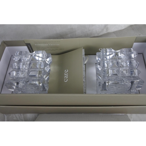 717 - Two boxed Tipperary Crystal candlesticks, a Tyrone Crystal photograph frame, a boxed Special Memorie... 