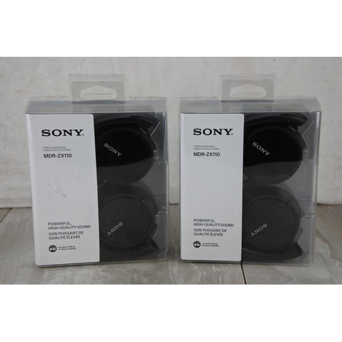 718 - Two boxed Sony MDR-ZX110 headphones.