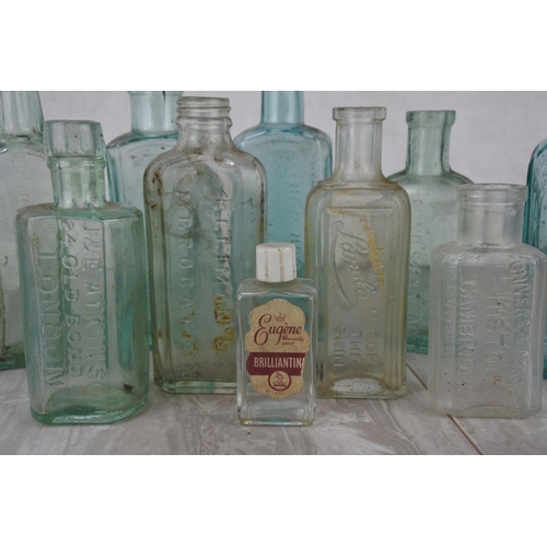 724 - A lot of antique and vintage glass bottles to include Whitaker & Co Colourworks, Ponds Extract, Chiv... 