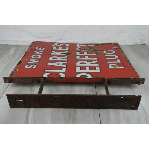 730 - A stunning double sided 'Smoke Clarke's Perfect Plug' enamel sign and bracket. approx46x51cm.