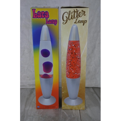 735 - Two boxed Lava Lamps.