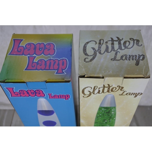 735 - Two boxed Lava Lamps.