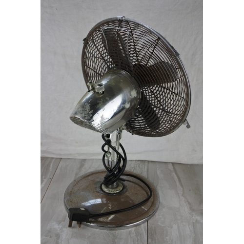 738 - A vintage table top electric fan.