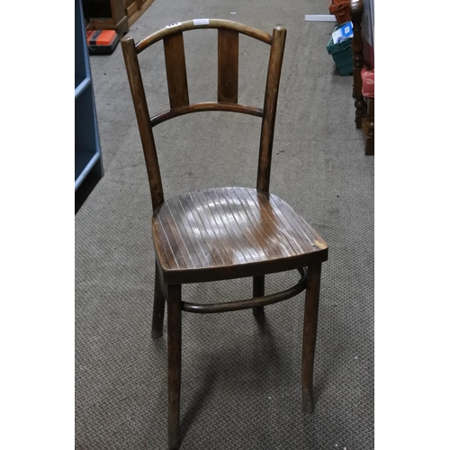 741 - A vintage wooden chair.