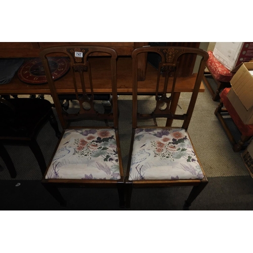 747 - A stunning pair of antique mahogany hall chairs with inlay detail.