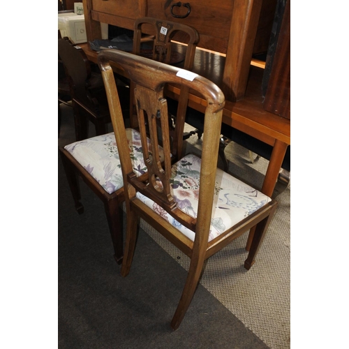 747 - A stunning pair of antique mahogany hall chairs with inlay detail.