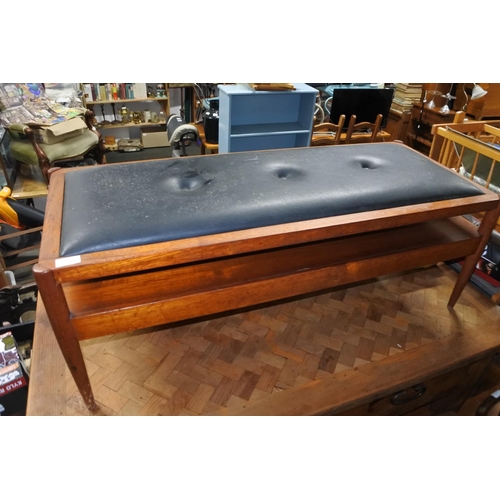 754 - A stunning mid century Danish coffee table/upholstered bench with storage undershelf.