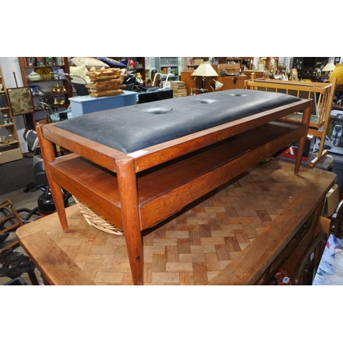 754 - A stunning mid century Danish coffee table/upholstered bench with storage undershelf.