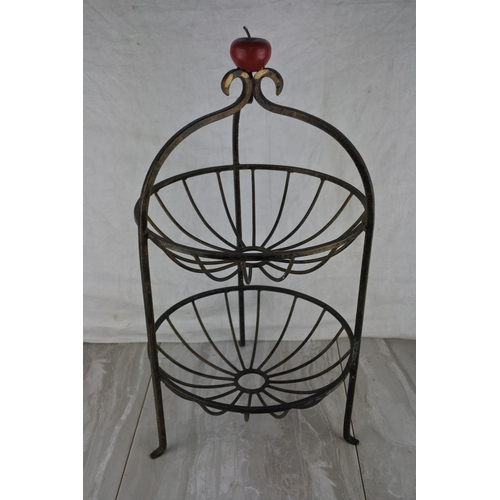 756 - A two tier fruit basket. approx 50cm.